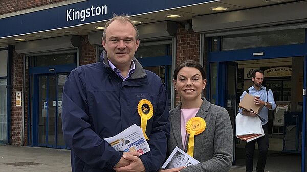 Ed Davey MP and Sarah Olney MP in front of Kingston station