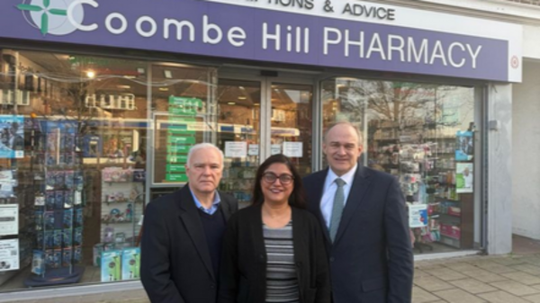 a photo of Lib Dem Councillor and Ed Davey MP with a local pharmacist.